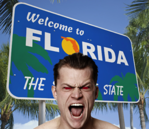 welcome to Florida sign with a red-eyed scary man in front